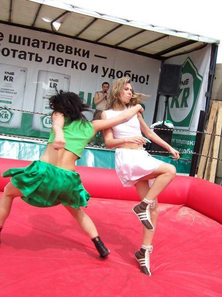 women wrestling women pose